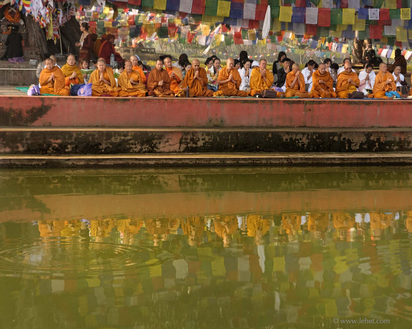 Theravada Monks Reflected in Pool Lumbini Nepal